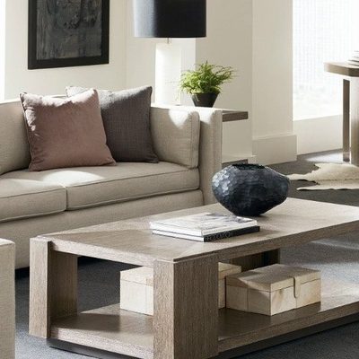 Living room with a low console table, sofa and framed artwork